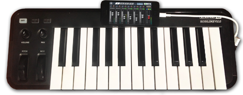 External MIDI Piano Keyboard plugged into iPhone